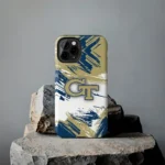 georgia-tech-yellow-jackets-brushstroke-clash-gold-white-phone-case-best-selling.webp