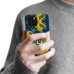 marquette-golden-eagles-brushstroke-clash-blue-white-phone-case-best-selling.webp