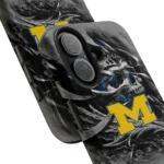 michigan-wolverines-skull-blades-blue-gray-phone-case-best-selling.webp