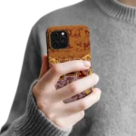 minnesota-golden-gophers-striped-overlay-maroon-phone-case-best-selling.webp