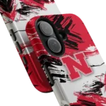nebraska-cornhuskers-brushstroke-clash-red-white-phone-case-best-selling.webp