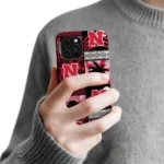 nebraska-cornhuskers-flamingo-palm-trees-red-phone-case-best-selling.webp
