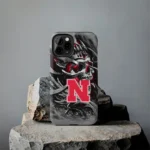 nebraska-cornhuskers-skull-blades-red-gray-phone-case-best-selling.webp