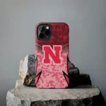 nebraska-cornhuskers-striped-overlay-red-phone-case-best-selling.webp