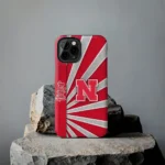nebraska-cornhuskers-sunburst-rays-red-phone-case-best-selling.webp