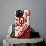 oklahoma-sooners-abstract-zigzag-crimson-phone-case-best-selling.webp