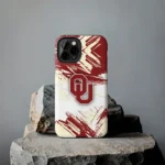 oklahoma-sooners-brushstroke-clash-crimson-white-phone-case-best-selling.webp