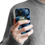 personalized-marquette-golden-eagles-camo-abstract-blue-phone-case-best-selling.webp
