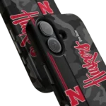 personalized-nebraska-cornhuskers-camouflage-stealth-red-gray-phone-case-best-selling.webp