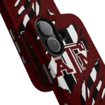 texas-am-aggies-claw-scar-maroon-black-phone-case-best-selling.webp