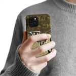 ucf-knights-striped-overlay-gold-phone-case-best-selling.webp