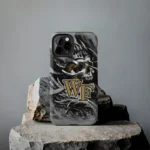 wake-forest-demon-deacons-skull-blades-gold-gray-phone-case-best-selling.webp